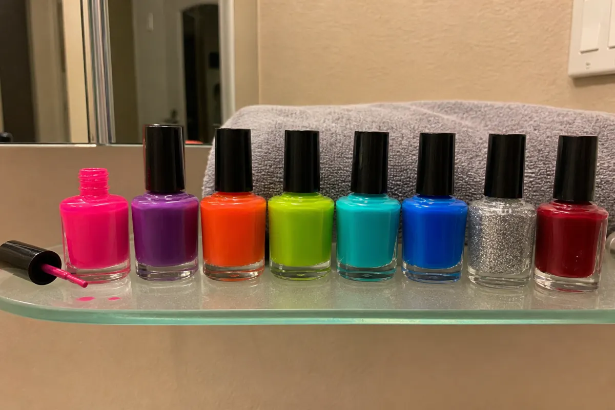 Nail polish bottles lined up for a party forfeit