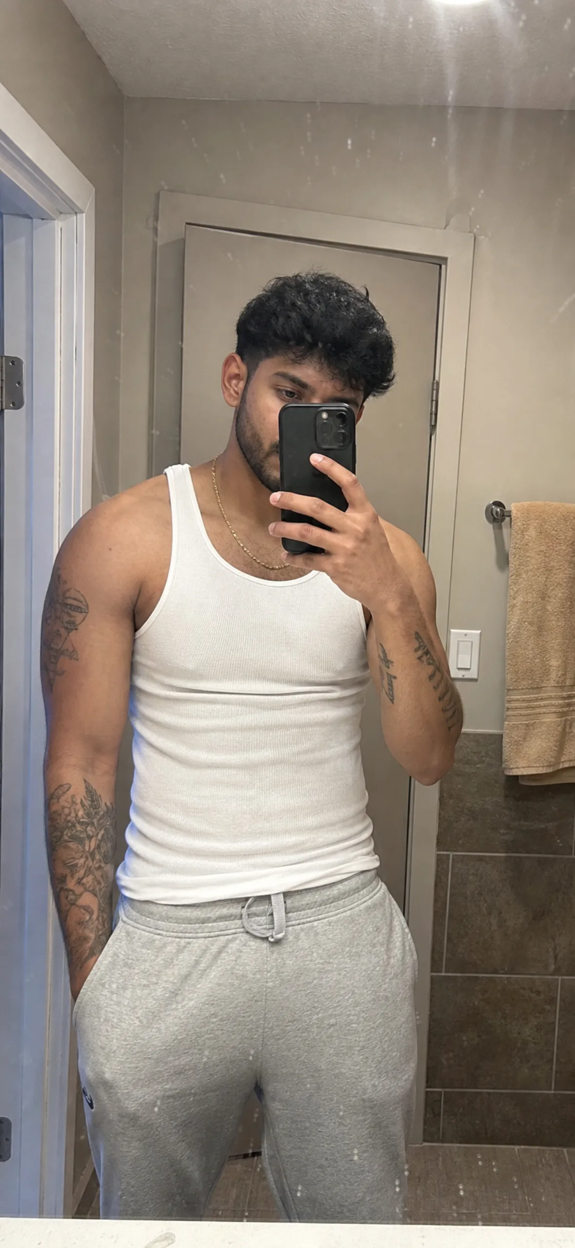 Fake call wallpaper — man taking a bathroom mirror selfie