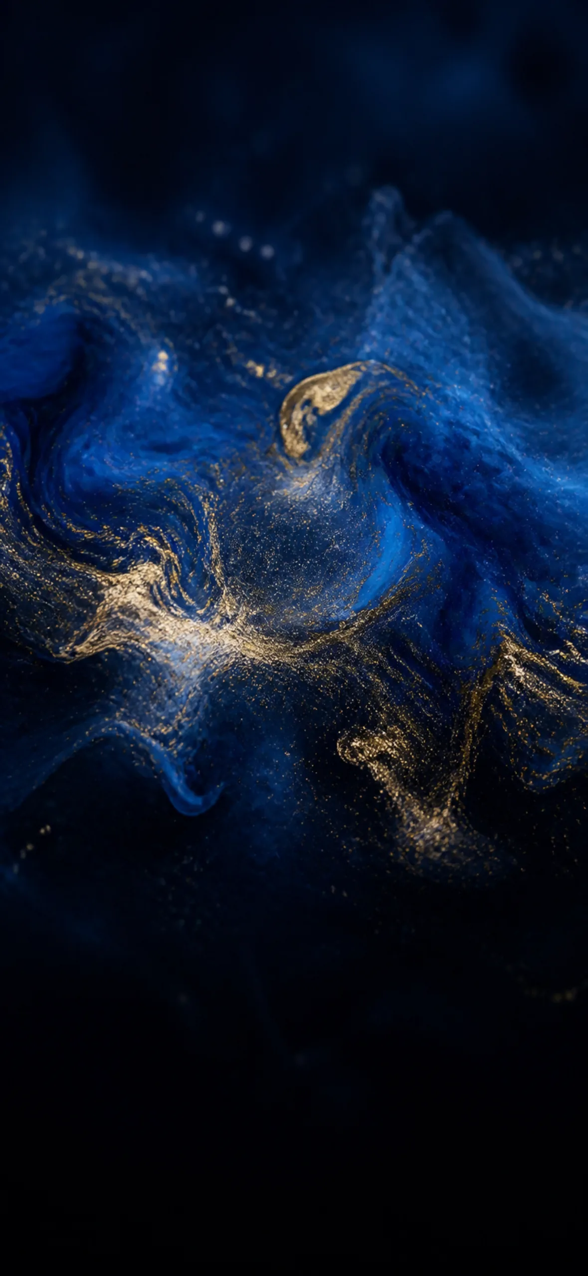 iPhone wallpaper — indigo and gold ink swirling in water