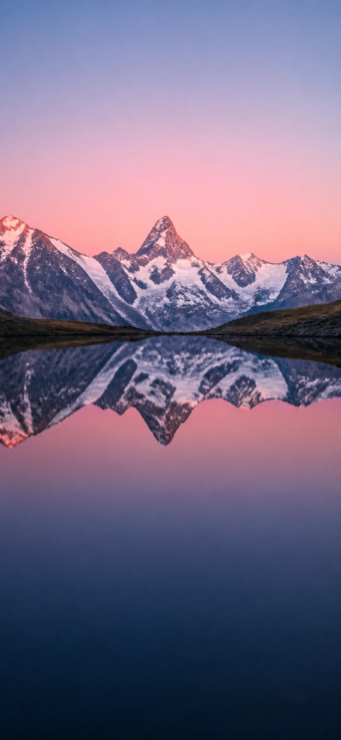 4k phone wallpaper — still alpine lake mirroring snow peaks at dawn