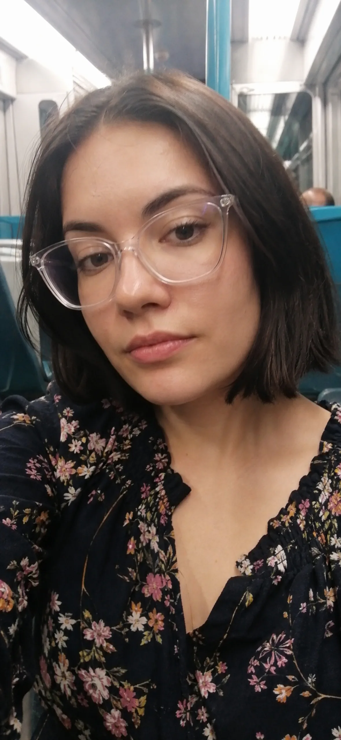 Prank call wallpaper — woman taking a selfie on a train